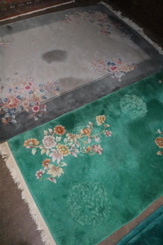Two Chinese floral embossed small carpets